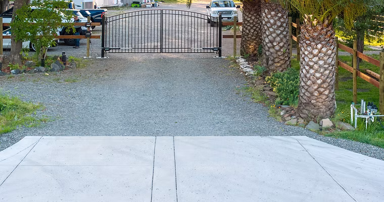 Gravel entrance drive and gate