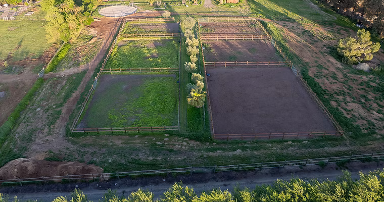 Aerial view of the outdoor arena and neighboring turnout areas